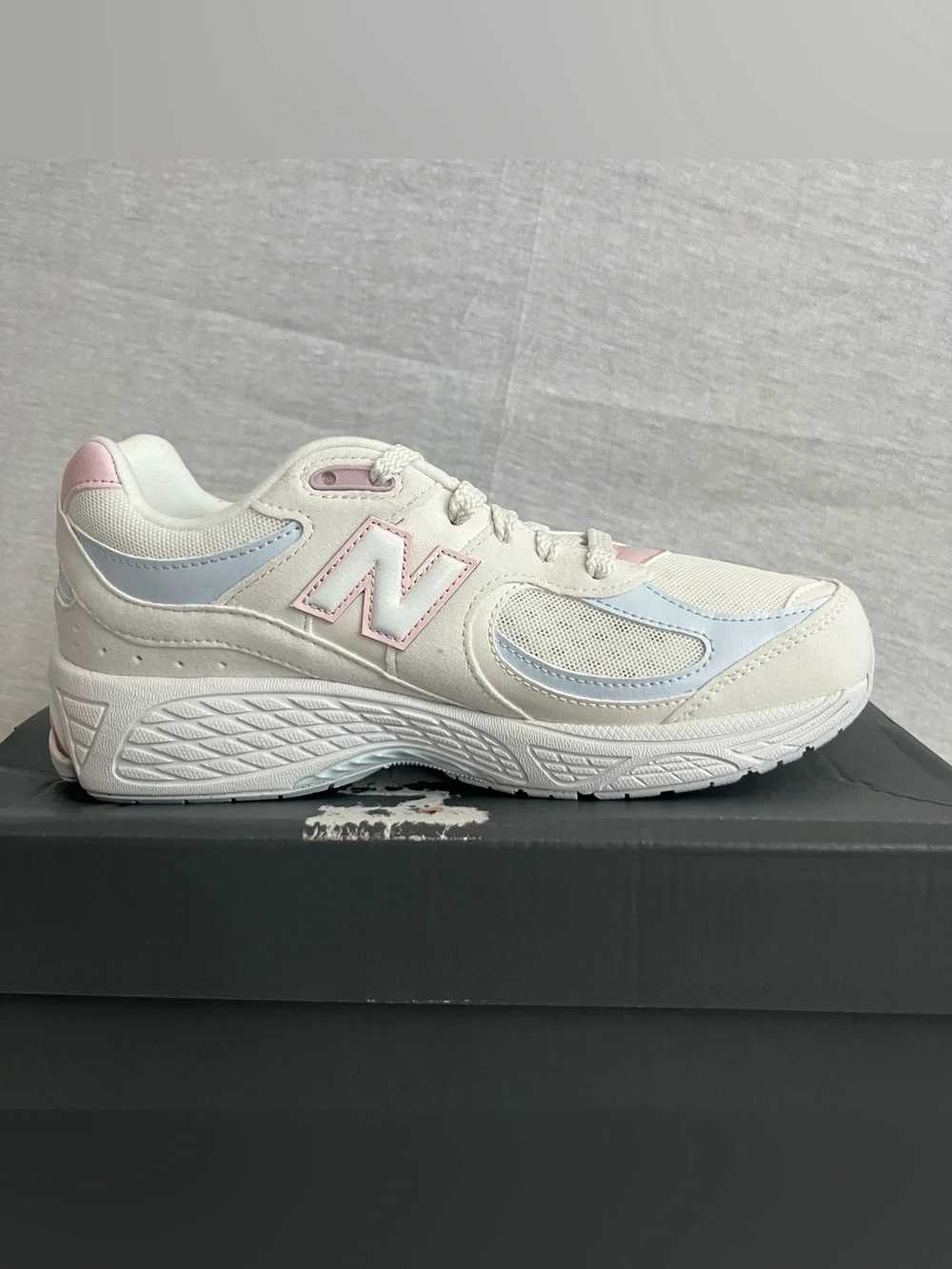 New Balance 2002 White Leather Sneakers with Pale Pink & Light Blue Accents